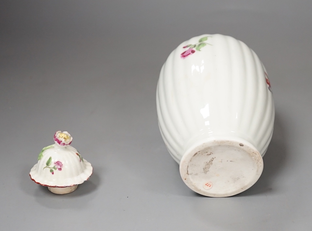 A Worcester tea canister and rare cover painted with flowers on a fluted body c.1770. 16.5cm